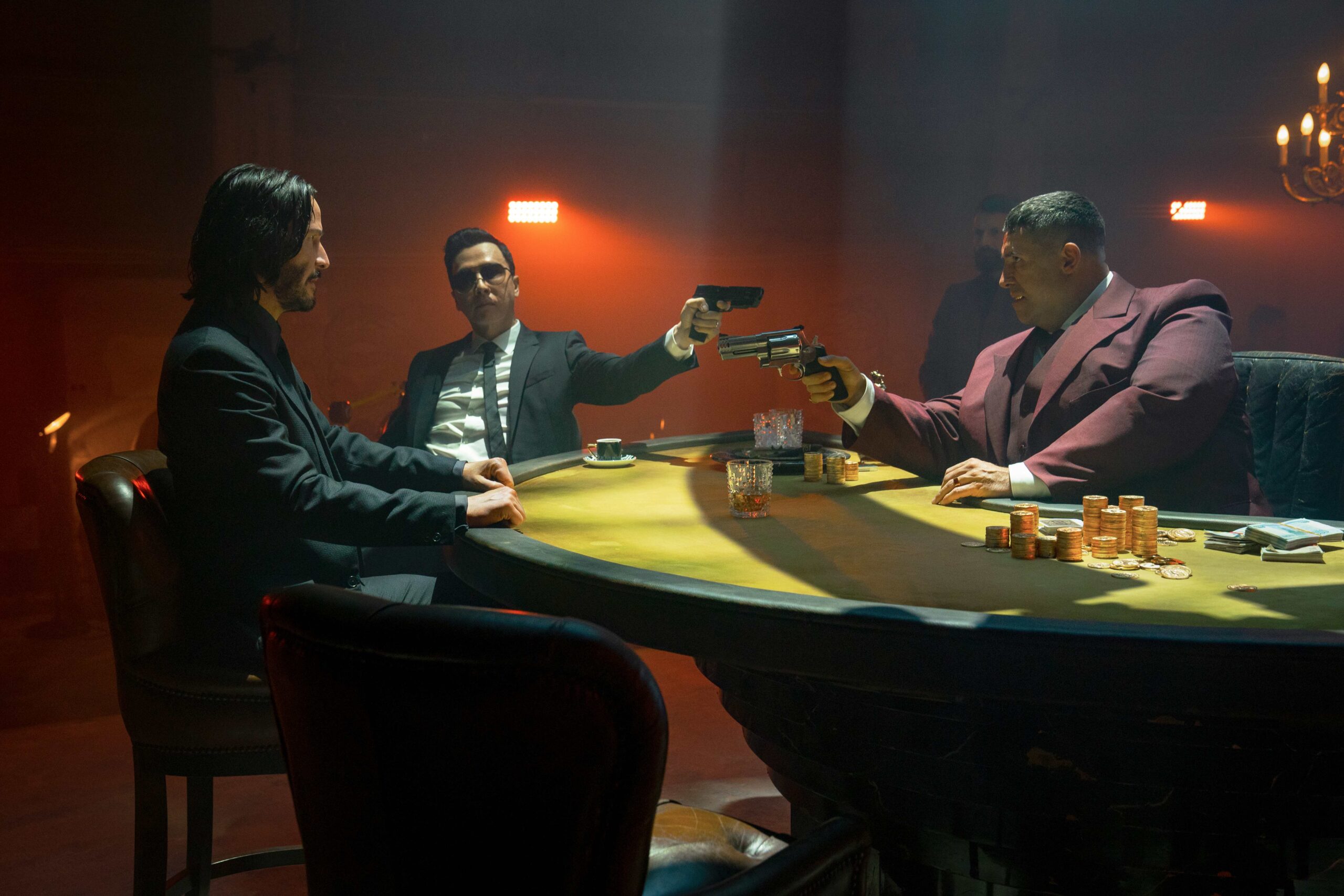 Keanu Reeves as John Wick, Donnie Yen as Caine, and Scott Adkins as Killa in John Wick: Chapter 4