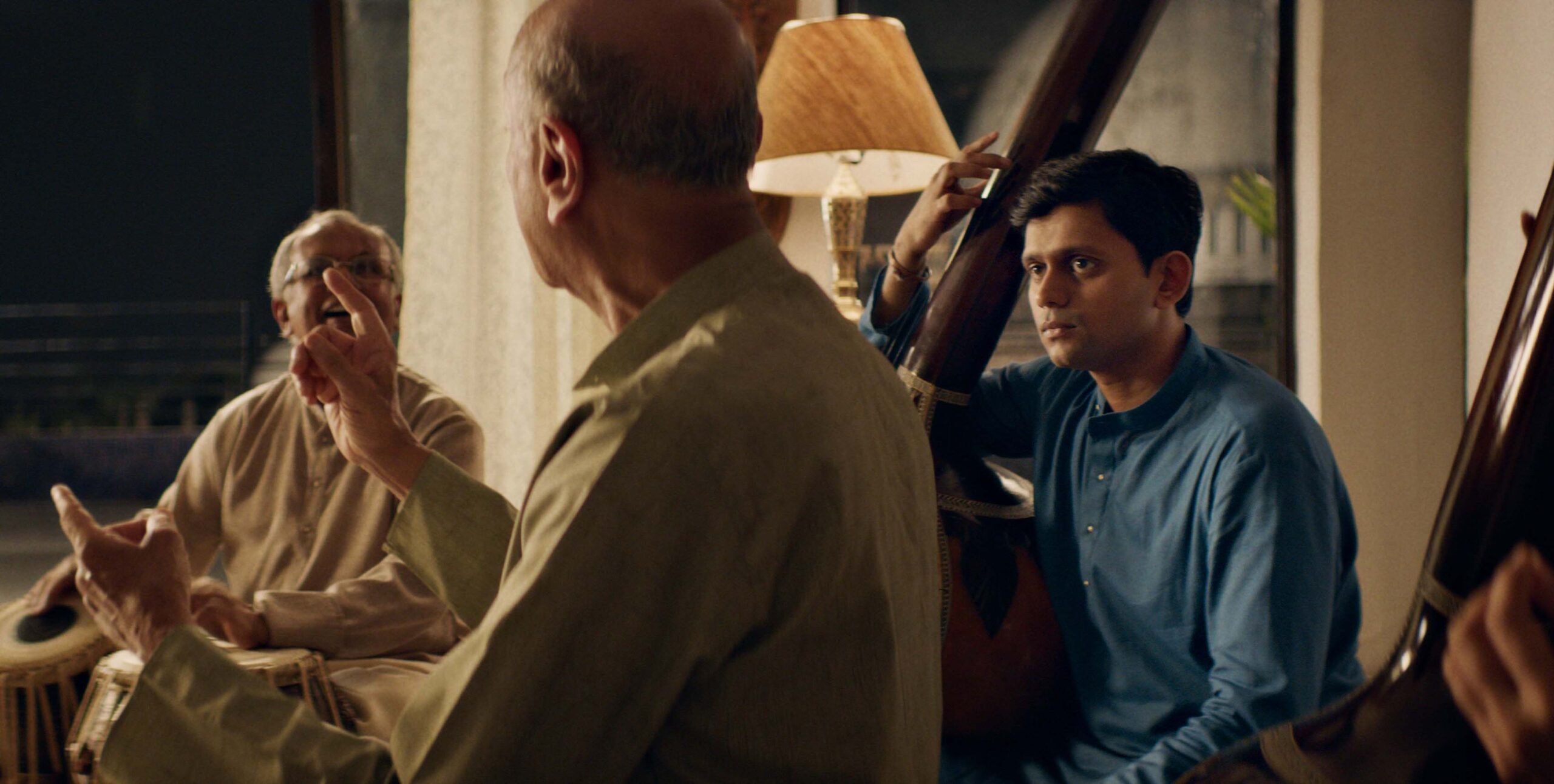 (from right) Aditya Modak and Arun Dravid in The Disciple