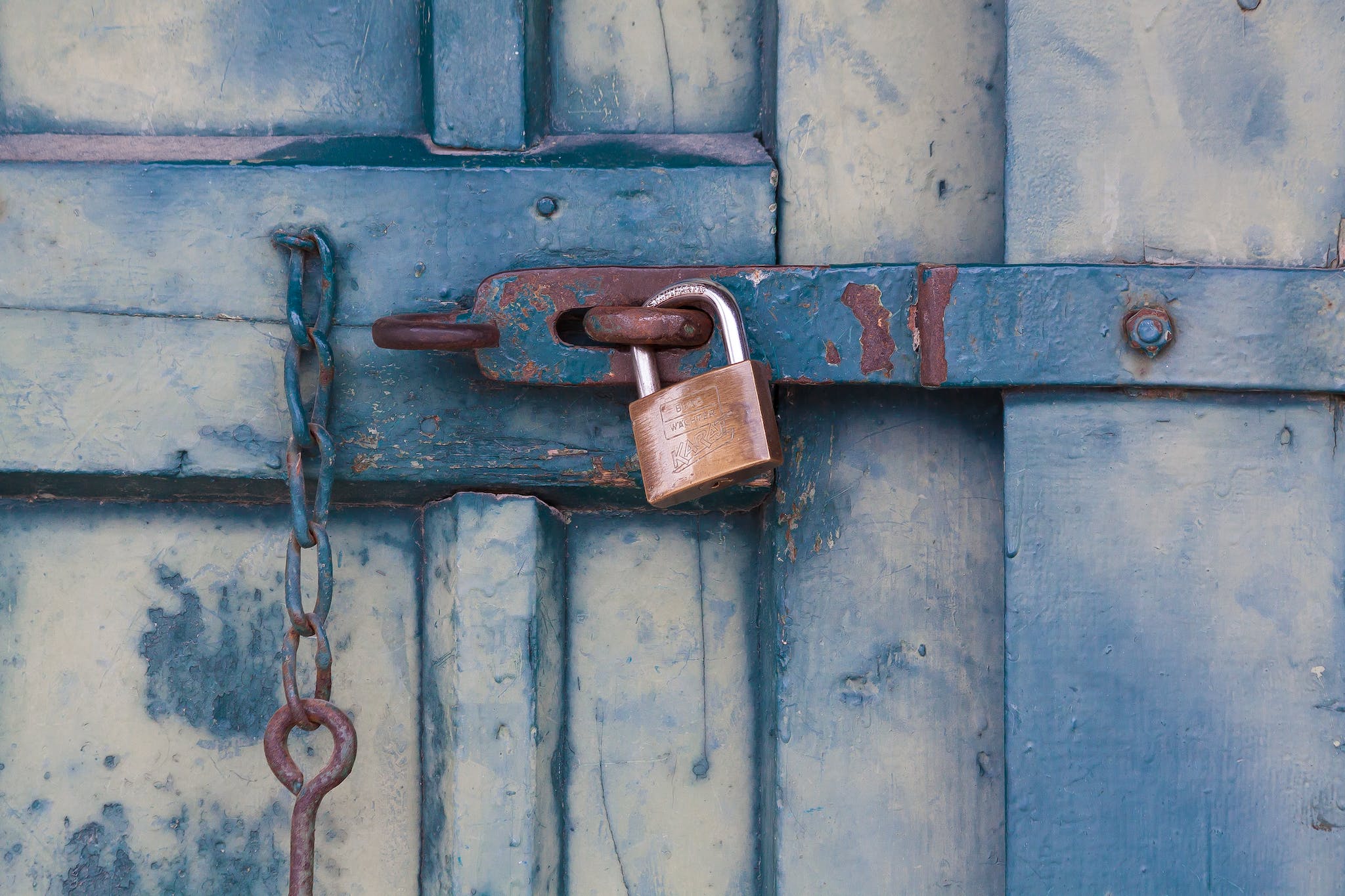 privacy policy illustration, gold padlock locking door