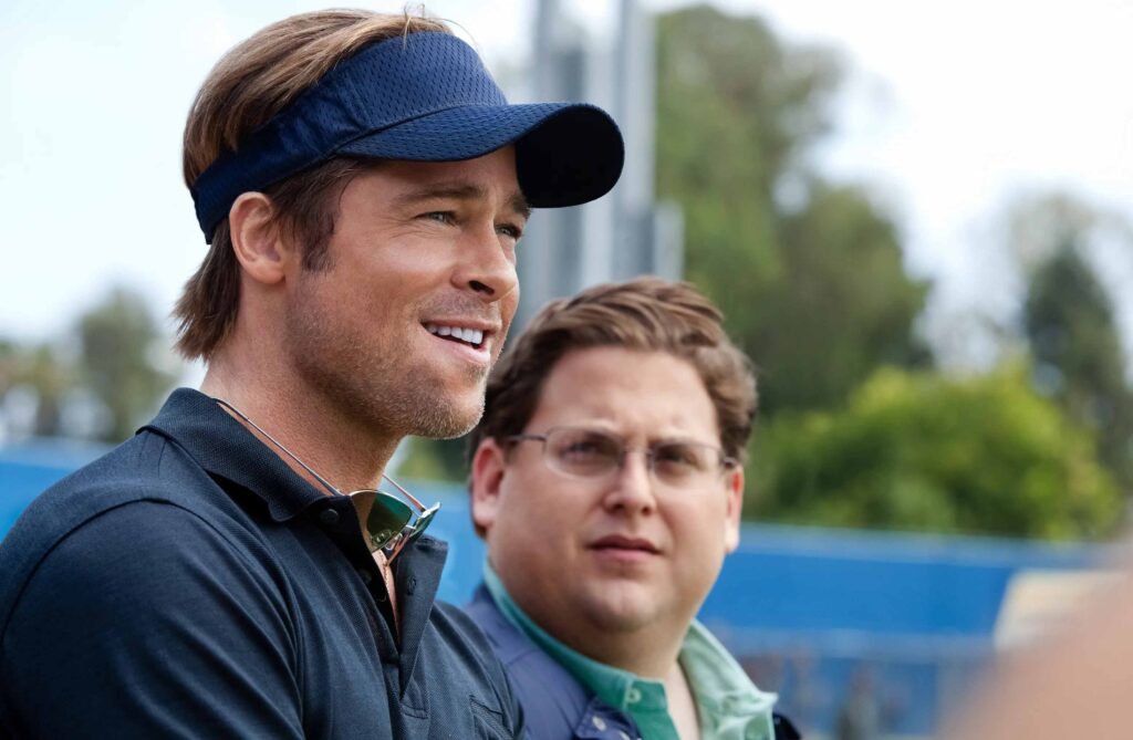 Brad Pitt and Jonah Hill in Moneyball, one of the best movies on Netflix